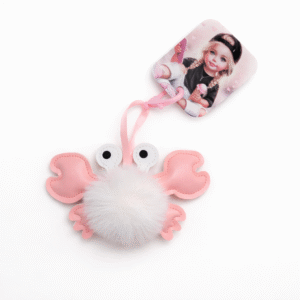 Rožinis raktų pakabukas