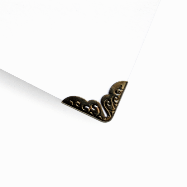 Dekoratyviniai geležiniai kampučiai